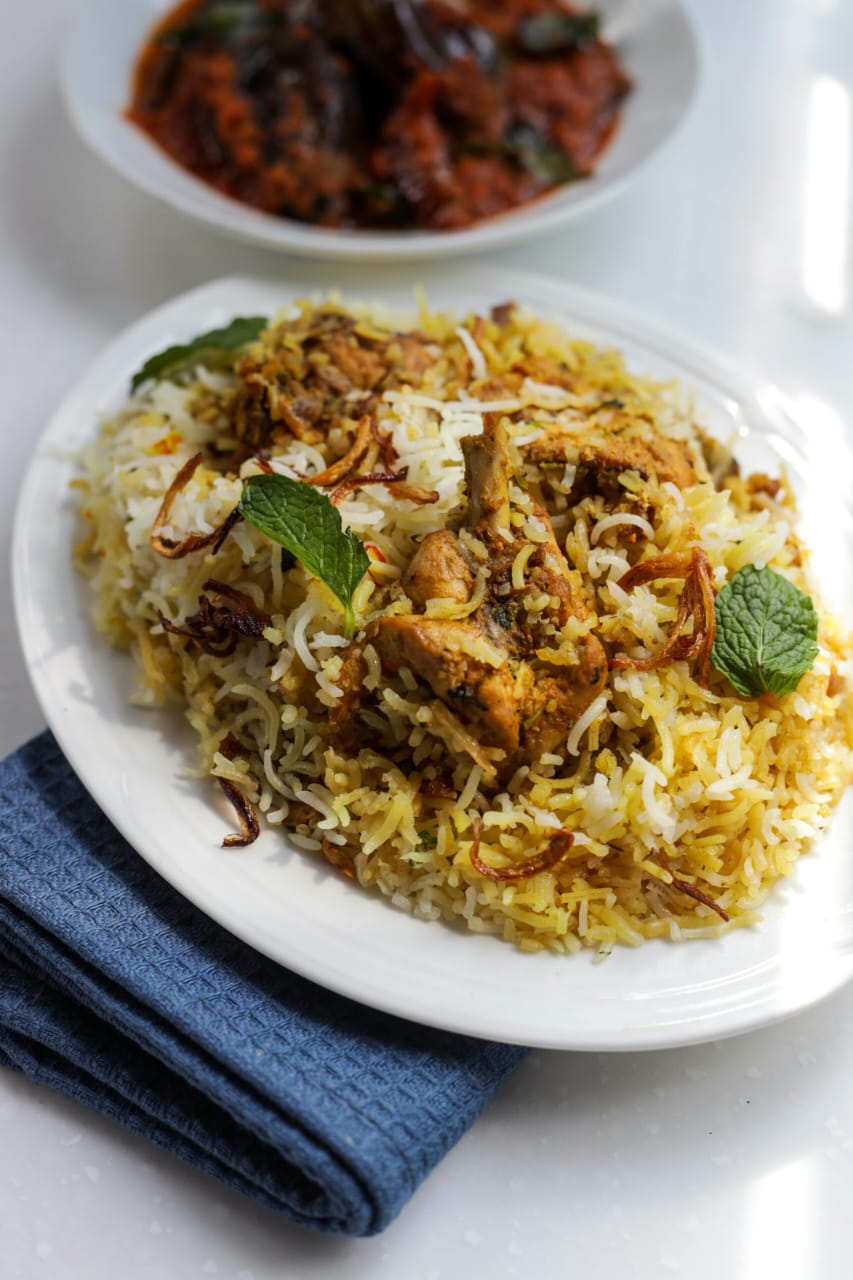 Step-by-step chicken biryani recipe with aromatic basmati rice and tender chicken